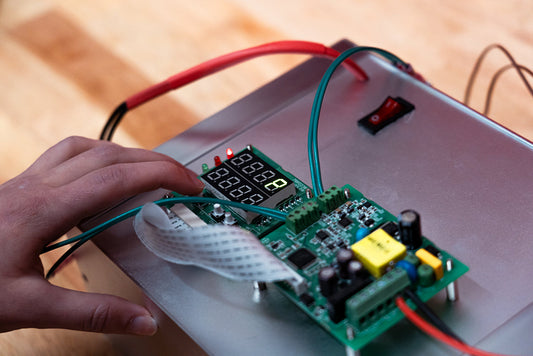 WHY SHOULD MY WARMING CABINET PC BOARD BE PRE-PROGRAMMED