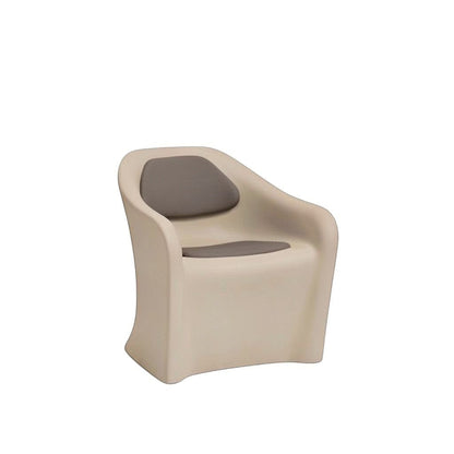 Stat Medical Inc Flo BH lounge chair in beige rotomolded plastic with grey upholstered seat and back pads.