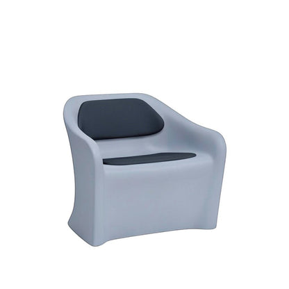 Stat Medical Inc Flo BH lounge chair with light grey rotomolded frame and dark grey upholstered seat and back pads.