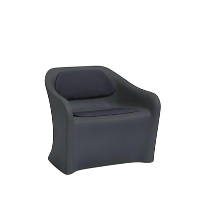 Stat Medical Inc Flo BH lounge chair in dark grey rotomolded plastic with a dark upholstered seat and back pad.