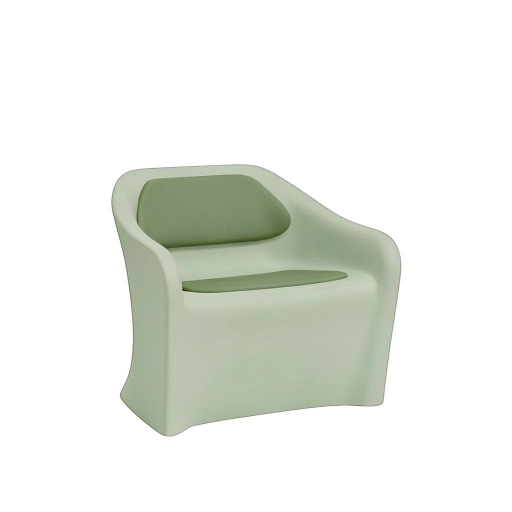 Stat Medical Inc Flo BH lounge chair in light green rotomolded plastic with matching green upholstered seat pads.