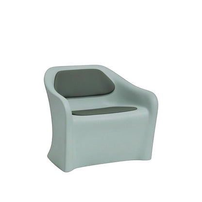 Stat Medical Inc Flo BH lounge chair in light grey rotomolded plastic with dark grey upholstered seat and back pads.