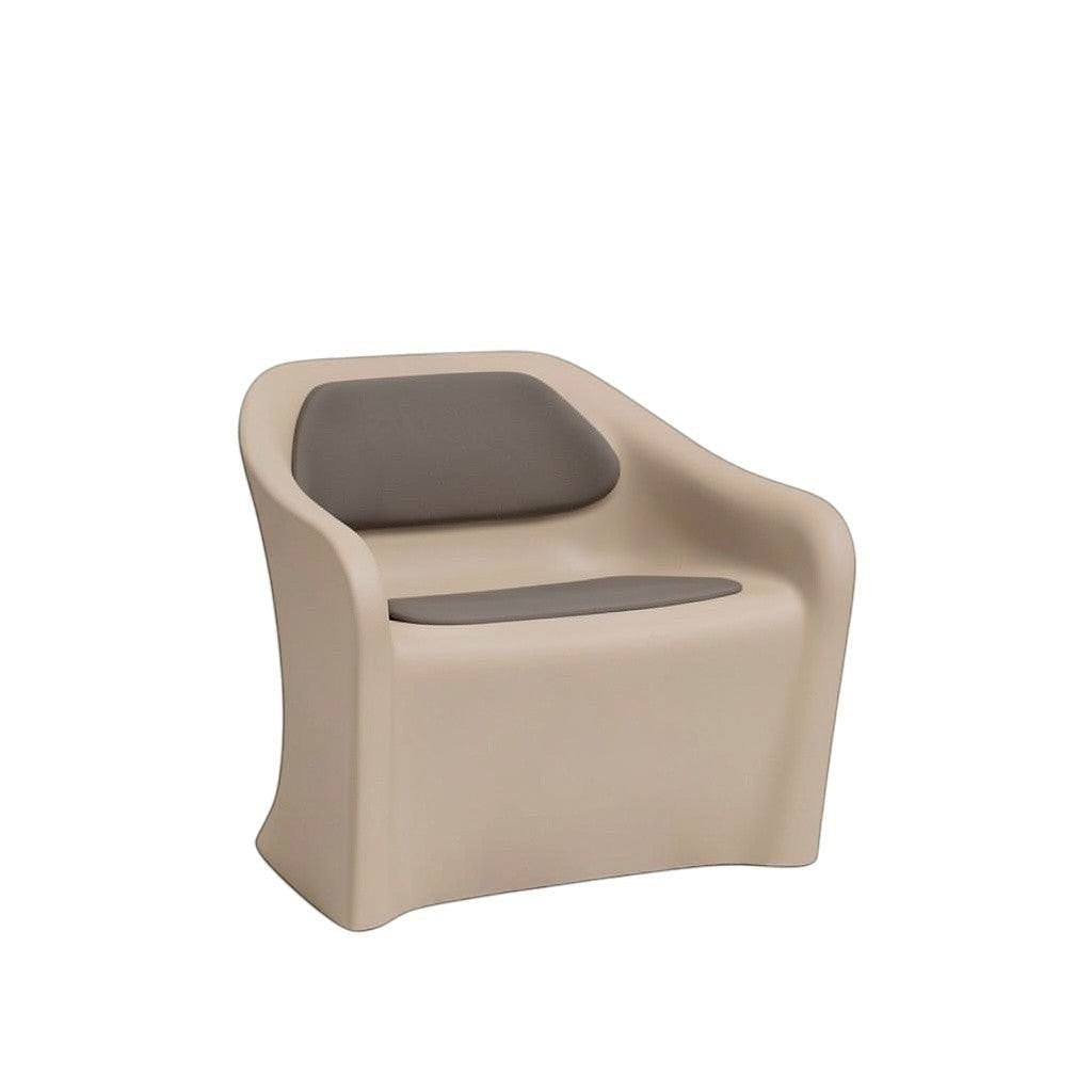 Stat Medical Inc Flo BH lounge chair in beige rotomolded plastic with grey upholstered seat and back pads.