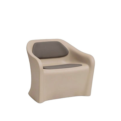 Stat Medical Inc Flo BH lounge chair in beige rotomolded plastic with grey upholstered seat and back pads.