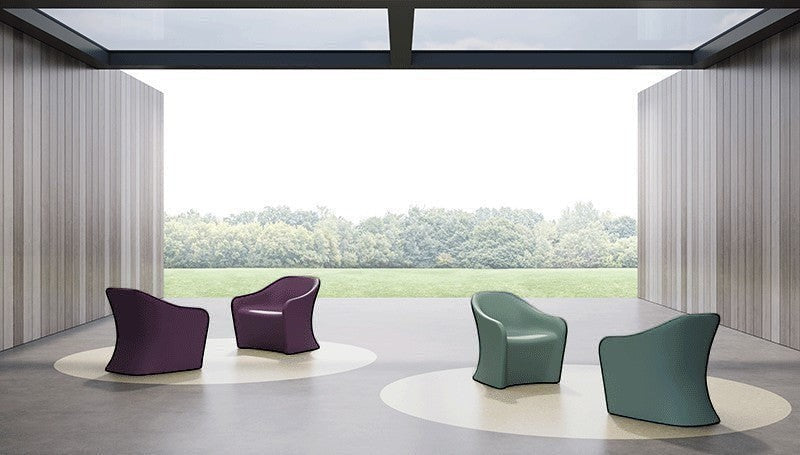 Four Flo Lounge chairs in a covered outdoor area for mental healthcare spaces