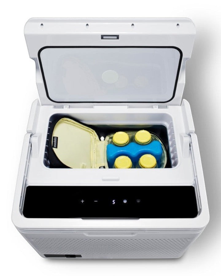 Station One Portable breast milk refrigerator shown from the top with the access panel open