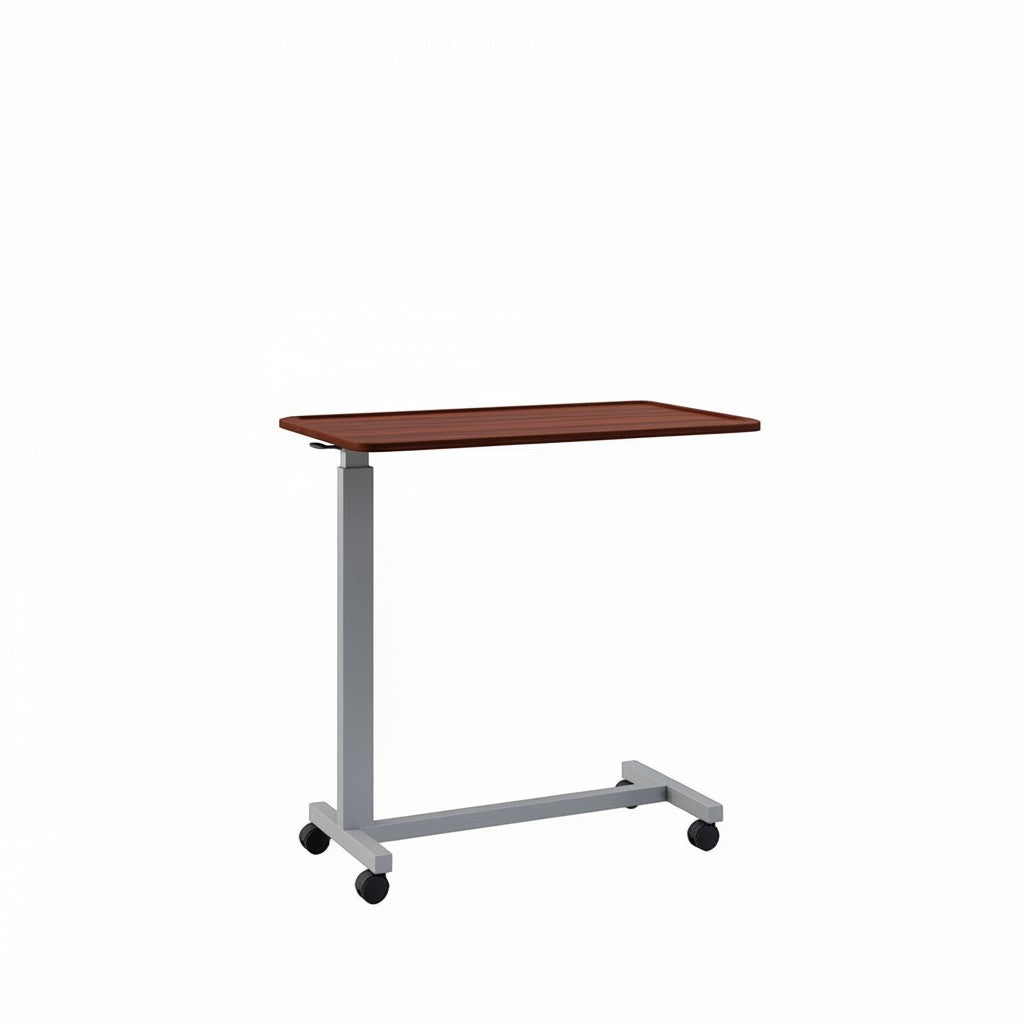 Stat Medical Inc Eclipse overbed table with a dark wood grain thermoformed top and grey powder-coated H-base.