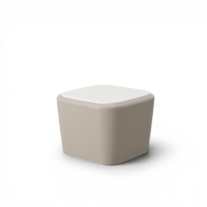 Stat Medical Inc Flo BH occasional table with a beige base and white top, featuring a safe, ligature-resistant design.